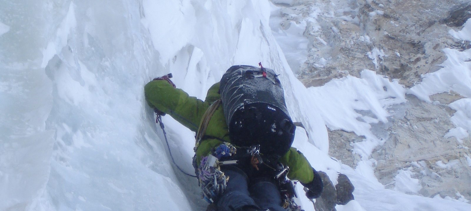 An ice climber carrying a CRUX pack